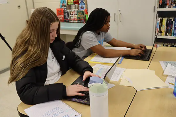 Students collaborate during a literacy lesson at Glacier Creek Middle School in Middleton-Cross Plains Area School District. 