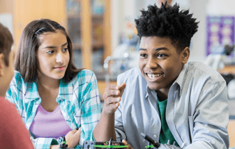 04-students-working-together-in-science-class-337x214.png