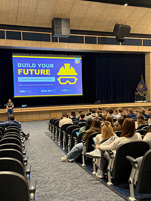 Norwin School District students attend a workforce development presentation about careers in the construction industry during a school-sponsored career readiness event.