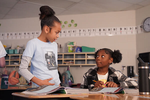 Two students from the Raymore-Peculiar School District talking about what they just learned in a myView Literacy lesson.