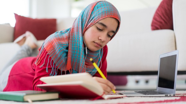 tile-hs-girl-writing-with-laptop.jpg