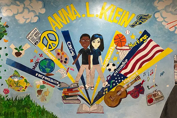 Photo of a colorful painted mural on the hallway walls of the Anna L. Klein School in the Guttenberg School DIstrict in Guttenberg, NJ. 
