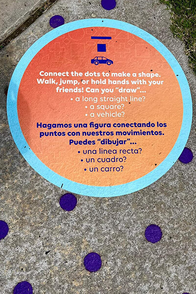 A photo of a math problem painted on the sidewalk in a park as part of Clayton County Public School’s math trails.