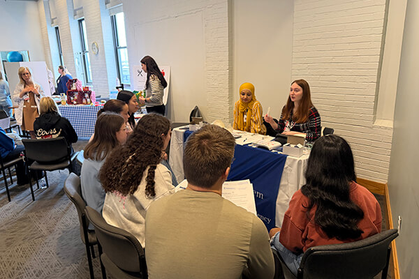 Norwin School District students speak with healthcare professionals during a workforce development and career exploration event focused on local career pathways and postsecondary opportunities.