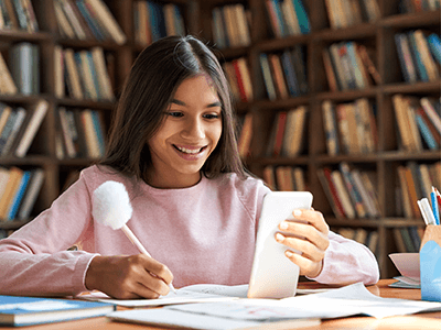 middle school student working on a smartphone