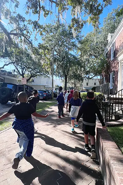 Students from the Susie King Taylor Community School outside the school in Savannah, Georgia. 