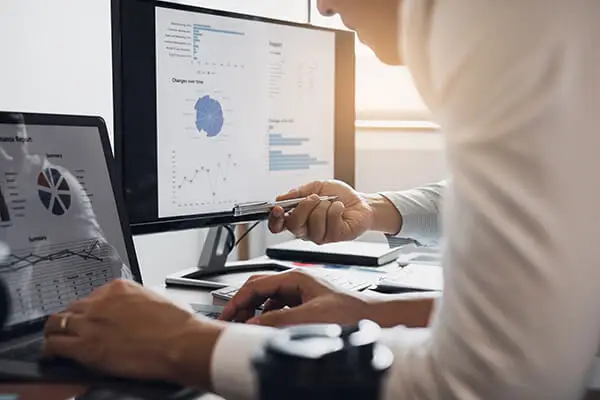 CTE teacher meeting with school administrator to discuss program outcomes and funding priorities