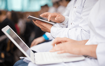 03-medical-students-using-laptop-and-digital-tablet-337x214.png