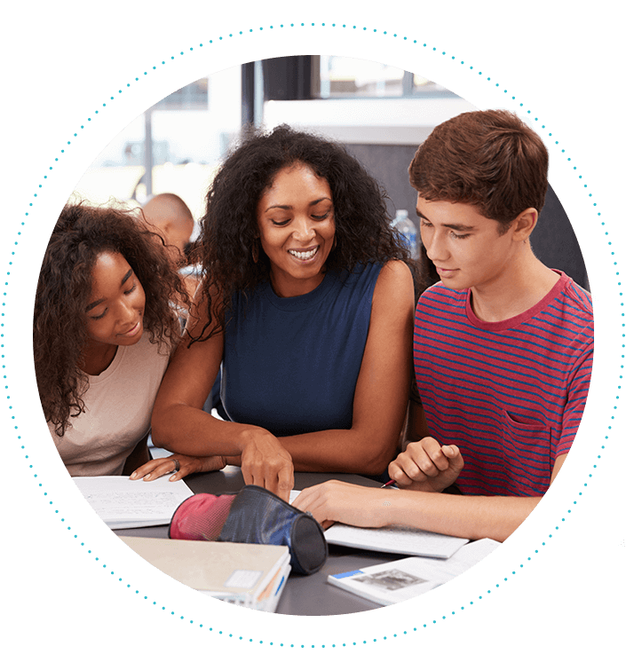 teacher-helping-group-of-high-school-students-in-class-705x755.png