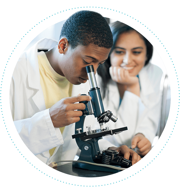 male-high-school-student-using-microscope-705x755.png