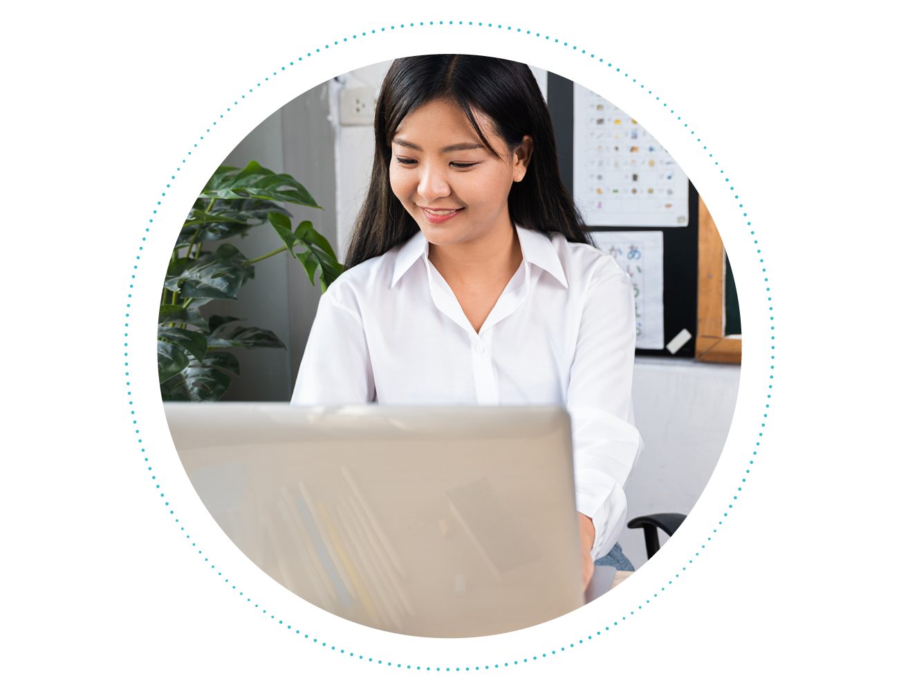 Photograph, educator in front of a laptop watching a free on-demand professional training webinar about the Science of Reading