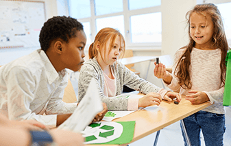 01-elementary-school-students-doing-recycling-group-project-337x214.png