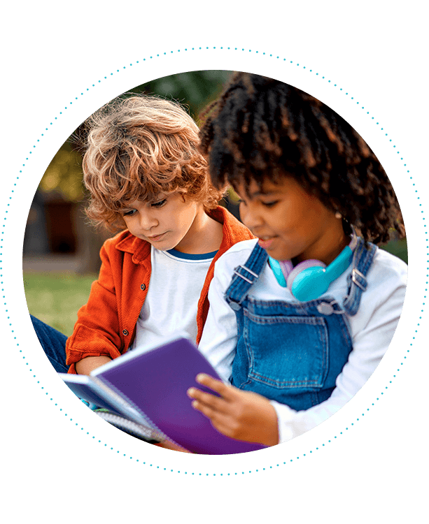 lower-elementary-two-kids-reading-outside-613x750.png
