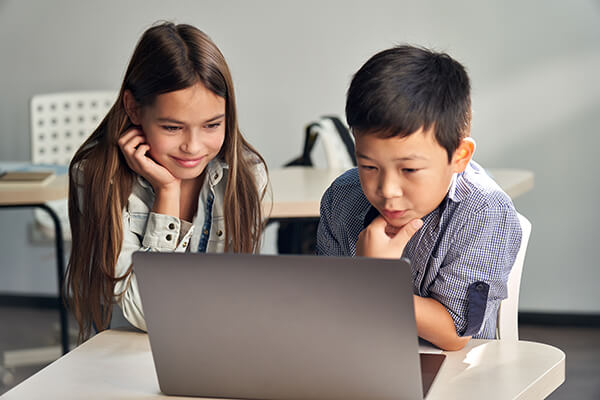 Two students working together on a math problem.