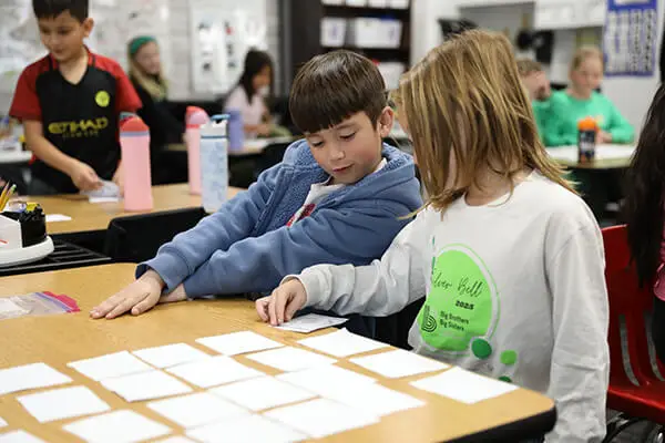 Elementary students collaborate during a literacy activity in a Dalton Public Schools classroom as part of the Dalton Reads initiative.