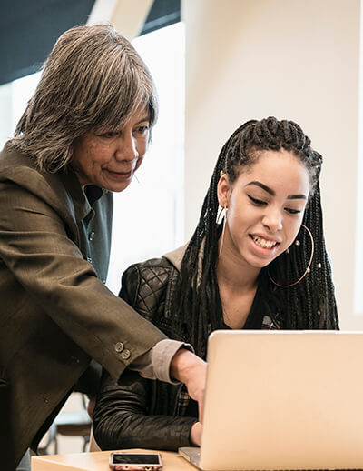 Teacher guiding student in evaluating AI-generated math content