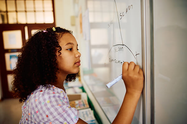Students in a classroom practicing math fluency.