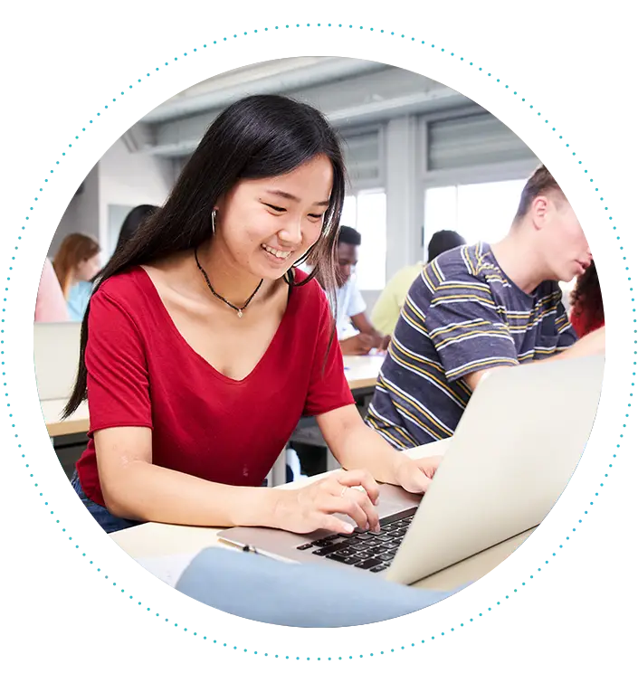 female-high-school-student-using-laptop-in-class-705x755.webp